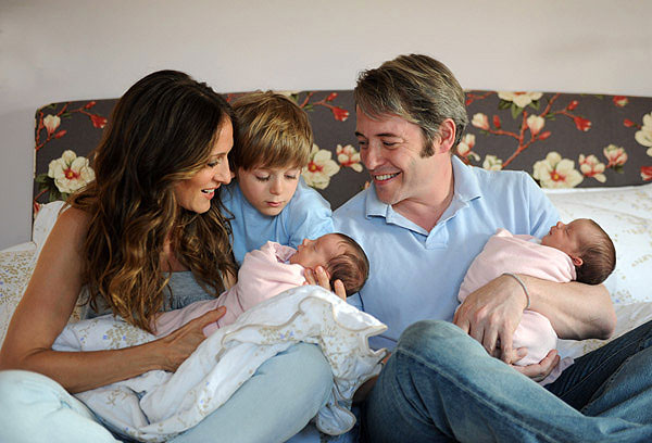 Sarah Jessica Parker and hubby Matthew Broderick are joined by son James Wilkie as they embrace their new twin girls, Marion Loretta Elwell and Tabitha Hodge, in New York City. The twins were born via surrogate on June 22.