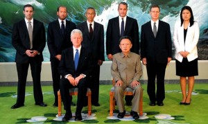 Photo released by North Korean official news agency KCNA shows former US president Bill Clinton (L, seated) and North Korea's leader Kim Jong-Il (R, seated) posing for a picture in Pyongyang on August 4, 2009. Kim Jong-Il met Clinton on Tuesday. According to the report, Clinton conveyed a verbal message from the U.S. President Barack Obama to Kim. But the White House denied that Clinton carried a message from Obama. [Xinhua/Korean Central News Agency] 