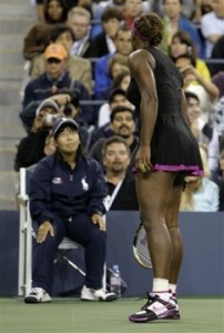 FILE - In this Saturday, Sept. 12, 2009 file photo Serena Williams, of the United States, argues with a line judge over a foot fault call during her match against Kim Clijsters, of Belgium, at the U.S. Open tennis tournament in New York. Grand Slam administrator Bill Babcock tells The Associated Press that Serena Williams has been fined a record US$82,500 for her tirade at this year's U.S. Open and could be suspended from that tournament if she has another "major offense" in the next two years. (AP Photo/Darron Cummings, File)
