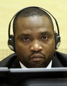 Former Congolese militiaman Germain Katanga listens to evidence during his trial at the International Criminal Court in The Hague. Katanga pleaded not guilty when he was accused of planning to wipe out an entire village as his soldiers killed civilians, raped women and enslaved child soldiers. (AFP/POOL/Michael Kooren)