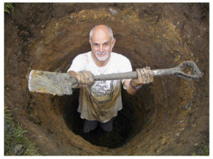 man_in_a_hole_with_shovel